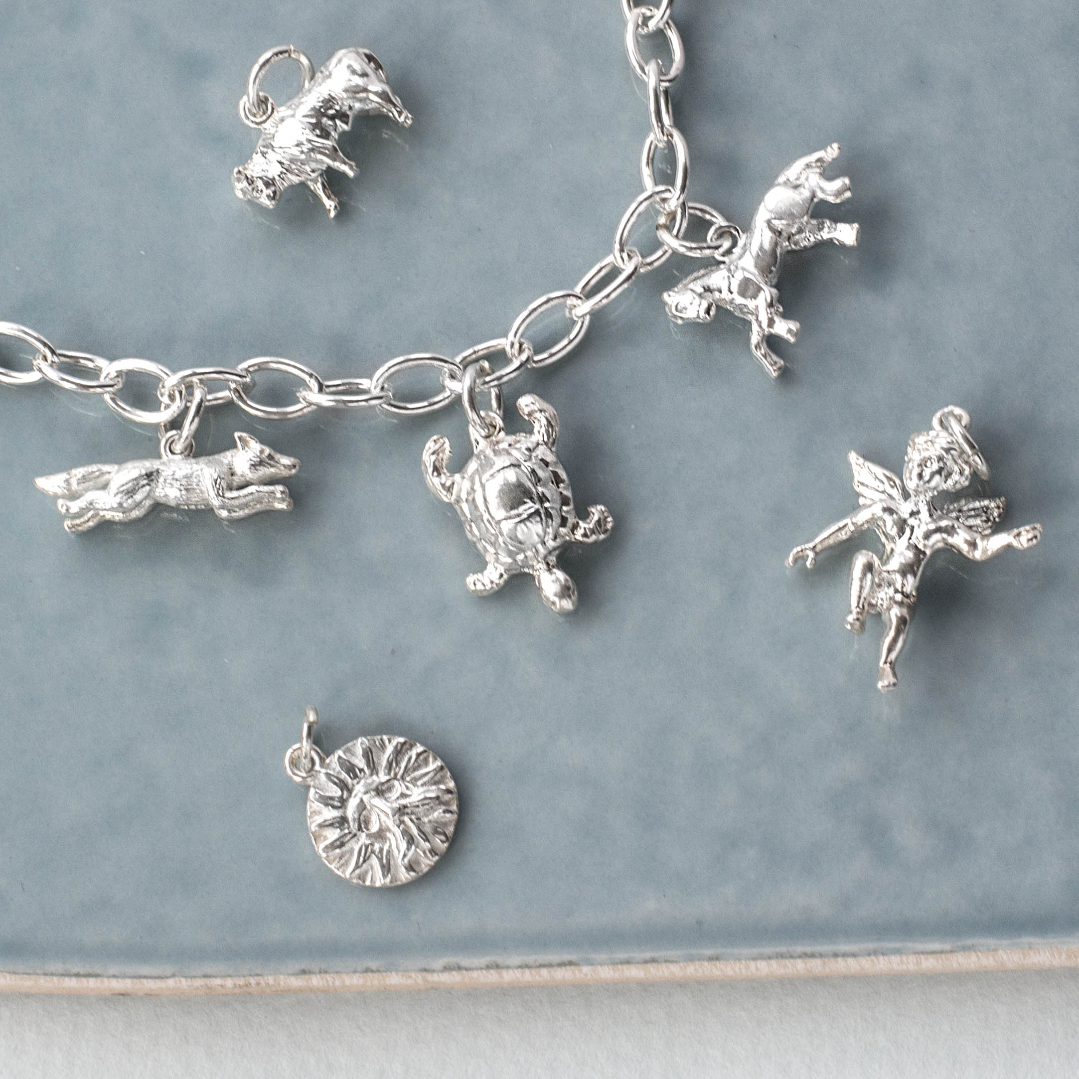 Sterling silver charms tray at The Silver Shop of Bath